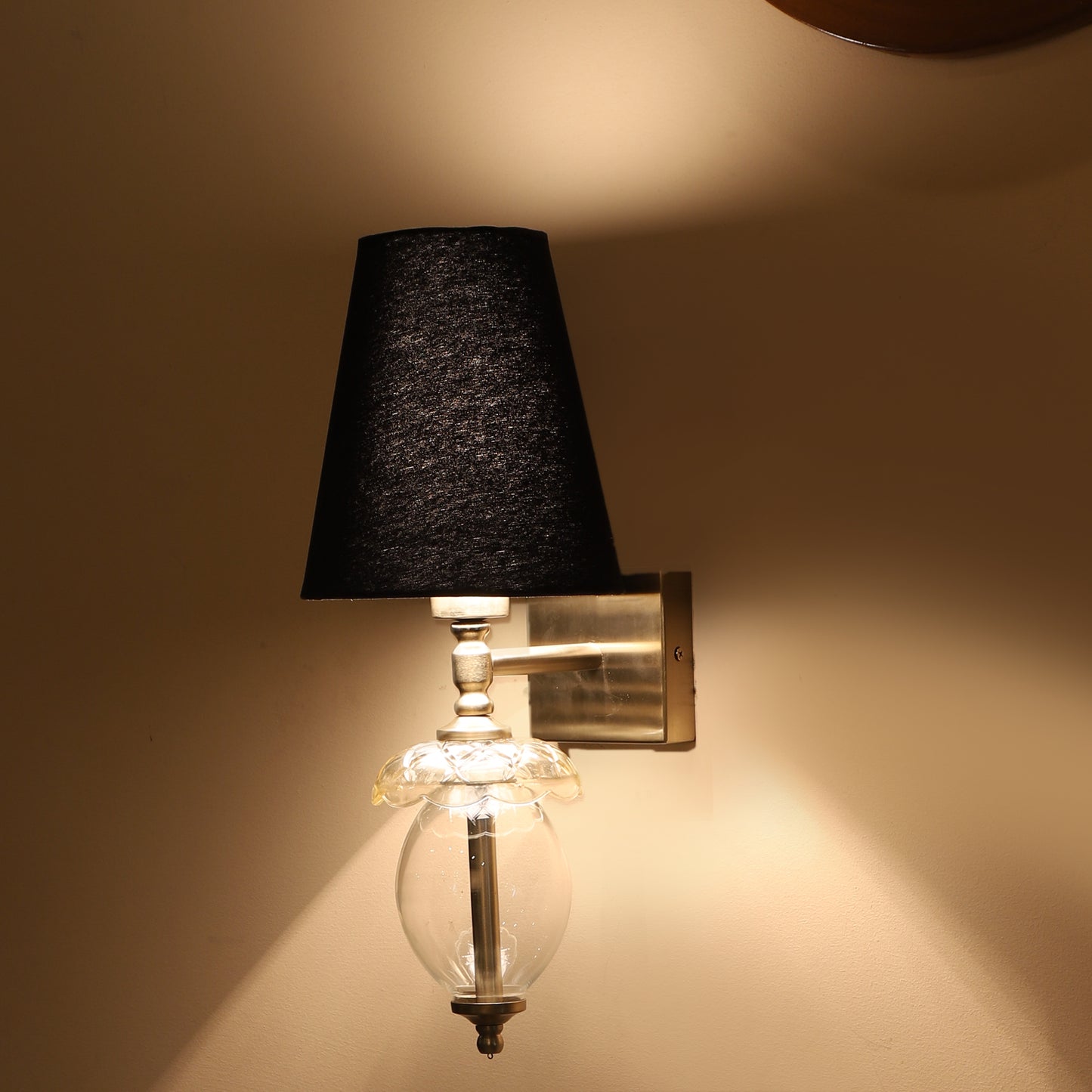 Square base single Wall Light with oval glass shape